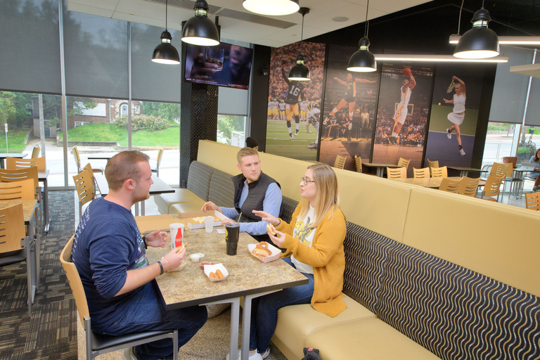 Students eating at a table