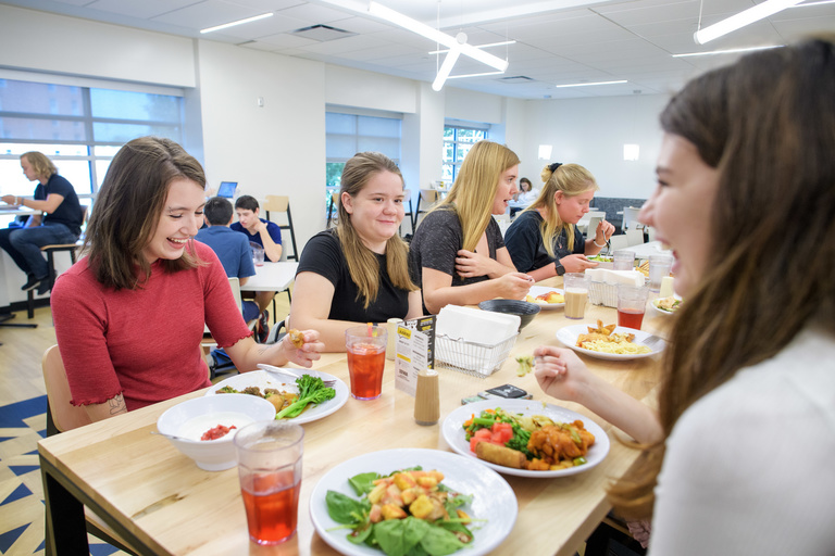 Students eating lunch at Burge
