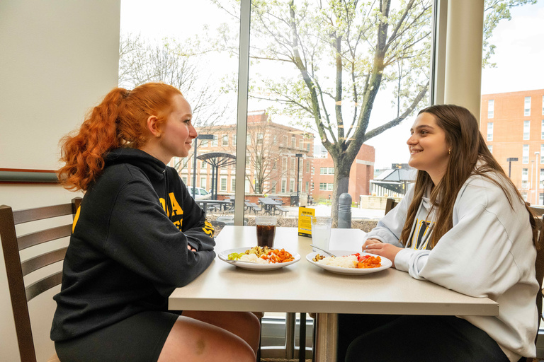 Two students eating