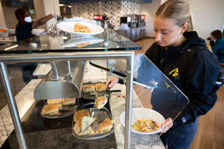 One student getting a panini sandwich