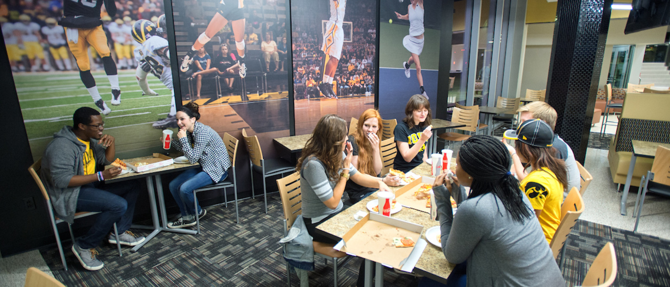 Students eating late-night snacks at Black's Gold Grill