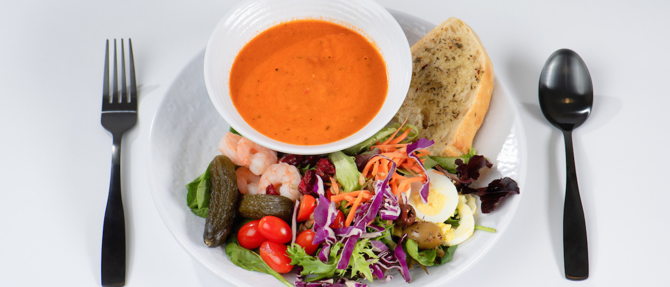 plate of soup, salad, shrimp