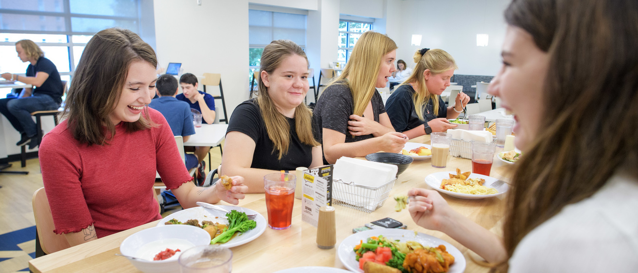 Students eating lunch at Burge